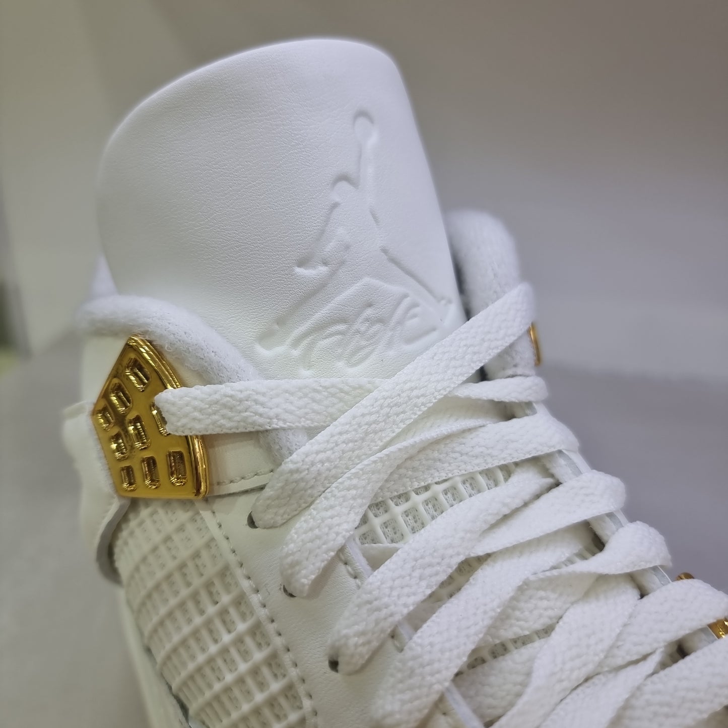 Jordan 4 Metallic Gold