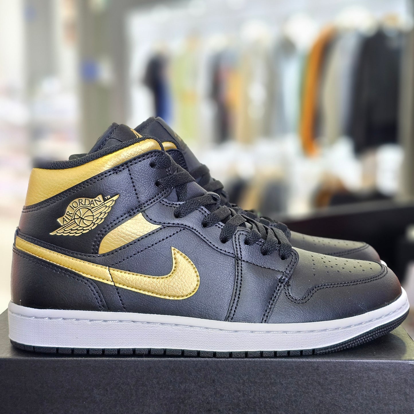 Jordan 1 Mid Black Metallic Gold