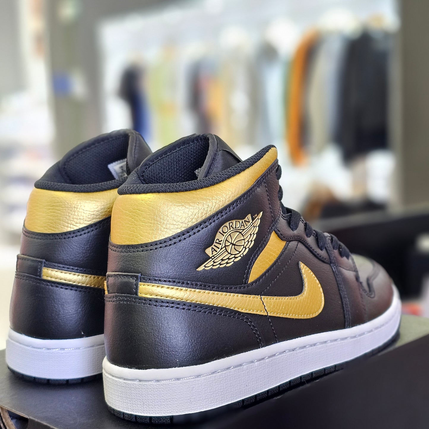 Jordan 1 Mid Black Metallic Gold