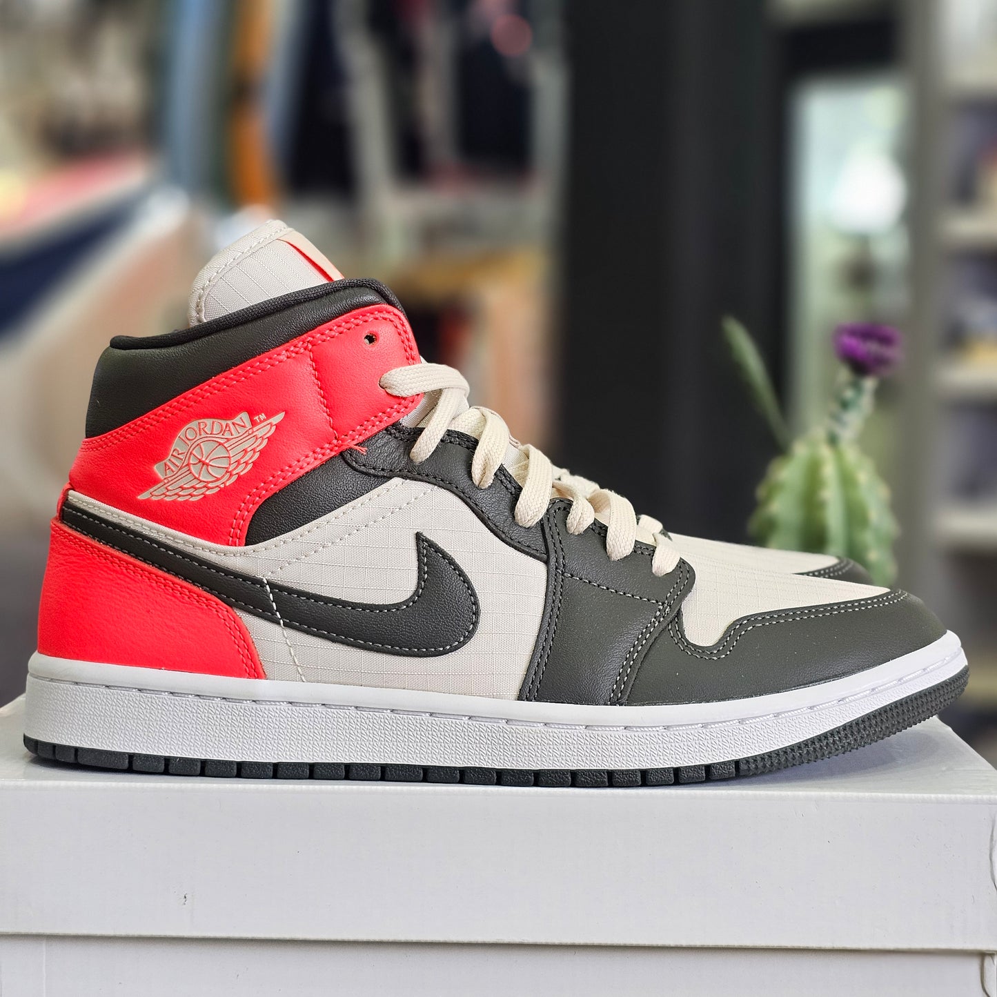 Jordan 1 Mid Newsprint