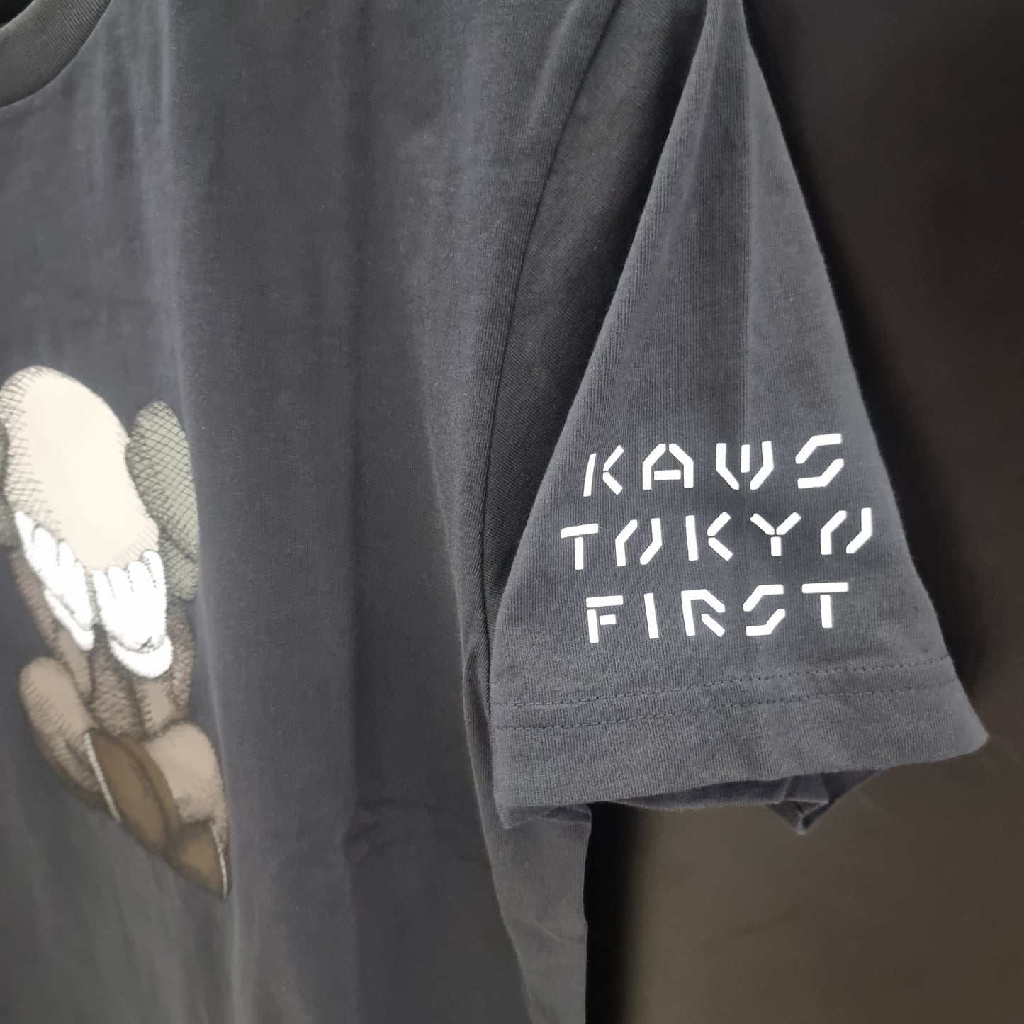 KAWS x Uniqlo Tokyo First Tee Graphic Tee Black