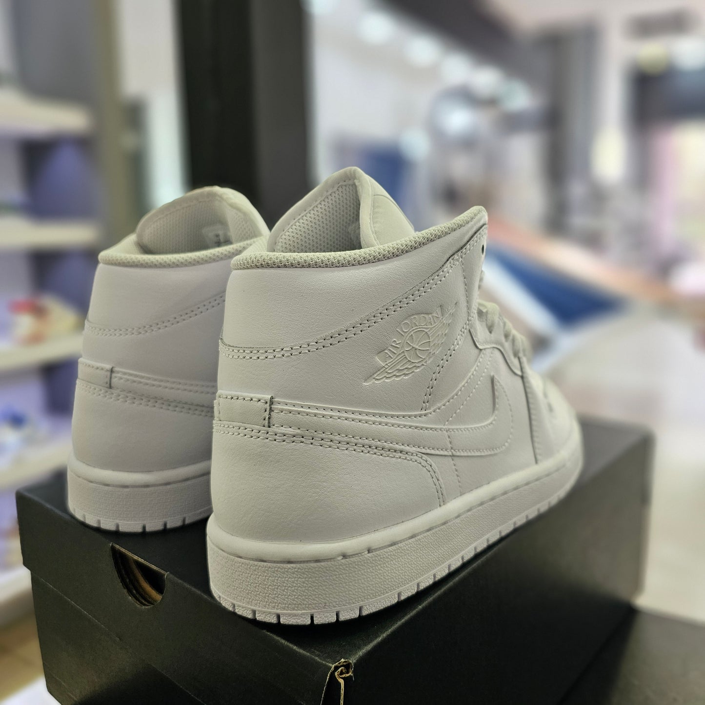 Jordan 1 Mid Triple White