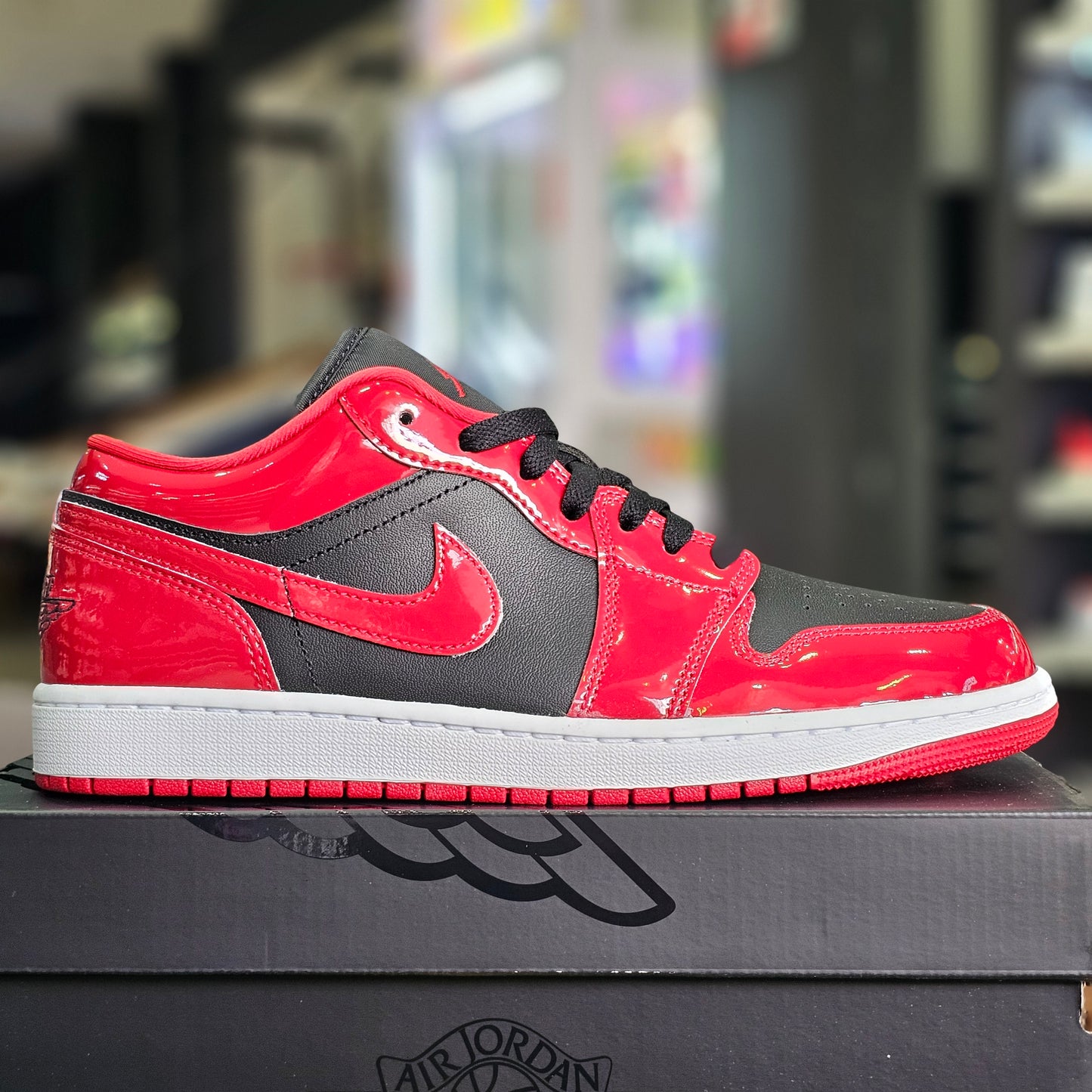 Jordan 1 Low Patent Varsity Red Black